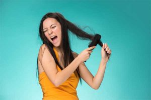 درمان خشکی مو با روغن شترمرغ هیوا